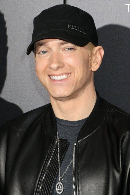 Guy Photoshops Smile To Eminem Photos (25 pics)