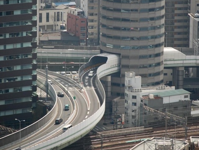 Gate Tower Highway In Japan Goes Through The Building (10 pics)