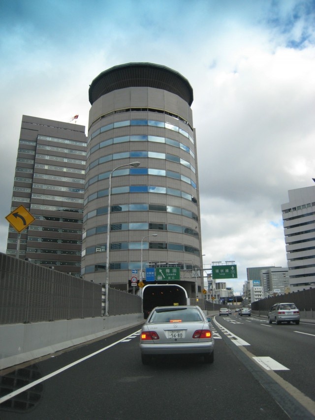 Gate Tower Highway In Japan Goes Through The Building (10 pics)