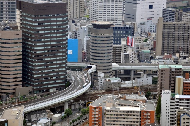 Gate Tower Highway In Japan Goes Through The Building (10 pics)