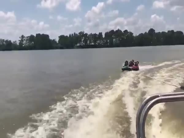 Kid Tubing Gets Hit By Leaping Fish