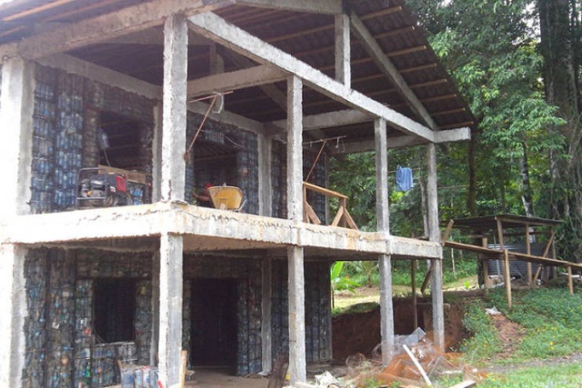 Houses Made Out Of Discarded Plastic Bottles (18 pics)