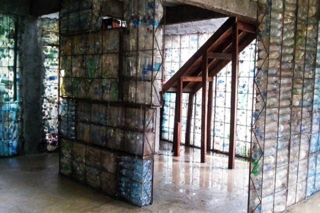 Houses Made Out Of Discarded Plastic Bottles (18 pics)