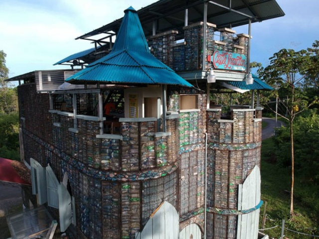 Houses Made Out Of Discarded Plastic Bottles (18 pics)