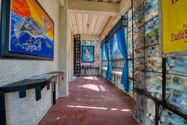 Houses Made Out Of Discarded Plastic Bottles (18 pics)