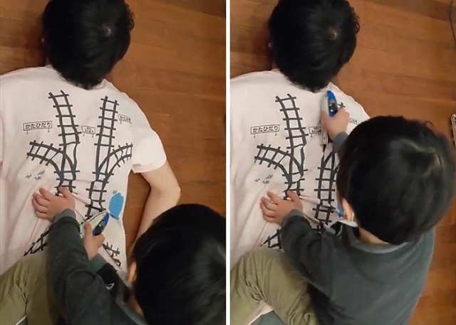 Japanese Dad Designs A T-Shirt With A Train Track So His Son Would Give Him A Massage While Playing (5 pics)