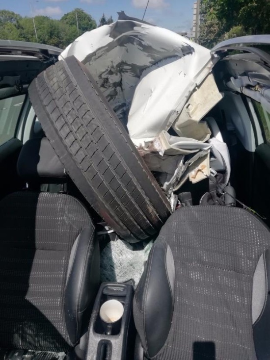 A HGV Wheel Smashes Through A Car Windscreen. The Driver Walks Away (4 pics)