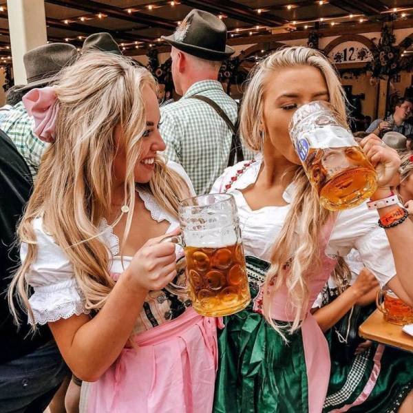 Sweet Girls With Beer At Oktoberfest
