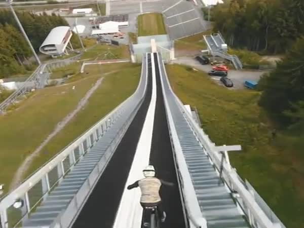 Riding A Bike Down A Ski Jump