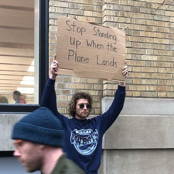 Guy With A Sign Shows Off Funny Statements (21 pics)