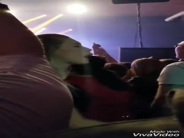 Girl Signing Lyrics At A Concert To Her Deaf Father