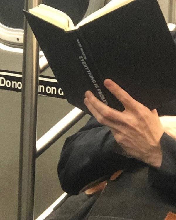 People Reading Interesting Books (44 pics)