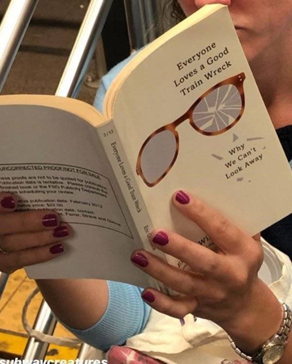 People Reading Interesting Books (44 pics)