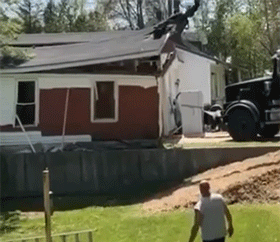 Property Dispute: Man Got Half Of His Neighbors Garage (9 pics)