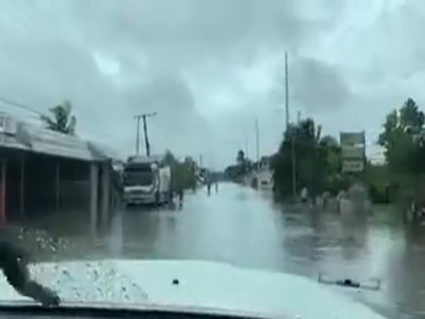 Riding On Flooded Street