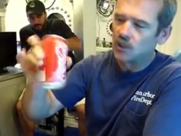 Opening A Shaken Can Near The Bottom Of The Ocean Floor