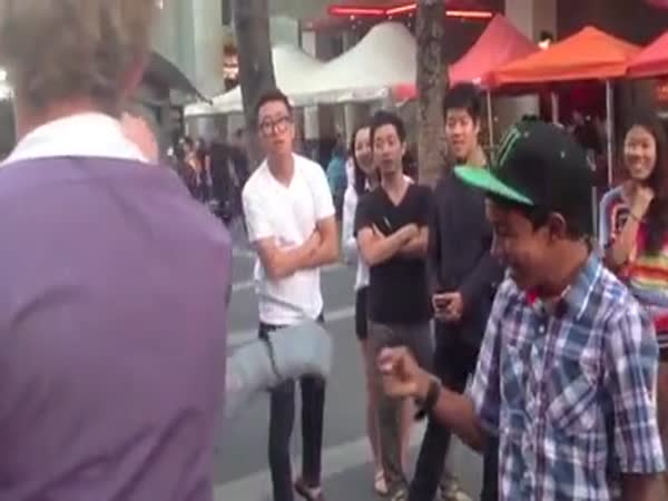 Guy Gets Punched By Street Performer