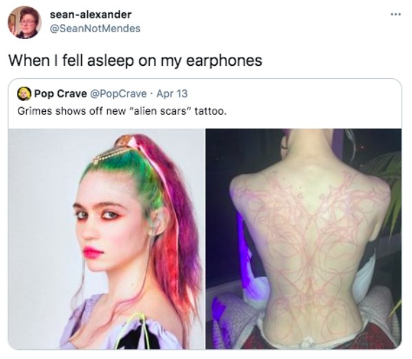 Grimes Massive Alien Scars Back Tattoo Will Make Your Jaw Drop  E  Online