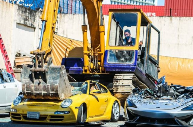 Smuggled Luxury Cars Were Publicly Destroyed By Philippines Government (15 pics)