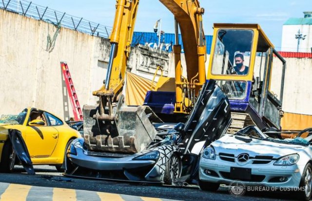 Smuggled Luxury Cars Were Publicly Destroyed By Philippines Government (15 pics)