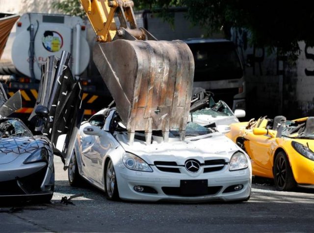 Smuggled Luxury Cars Were Publicly Destroyed By Philippines Government (15 pics)