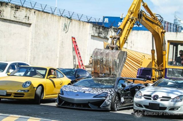 Smuggled Luxury Cars Were Publicly Destroyed By Philippines Government (15 pics)