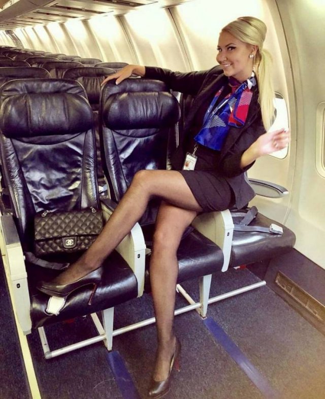 Flight Attendants With And Without Uniform (26 pics)