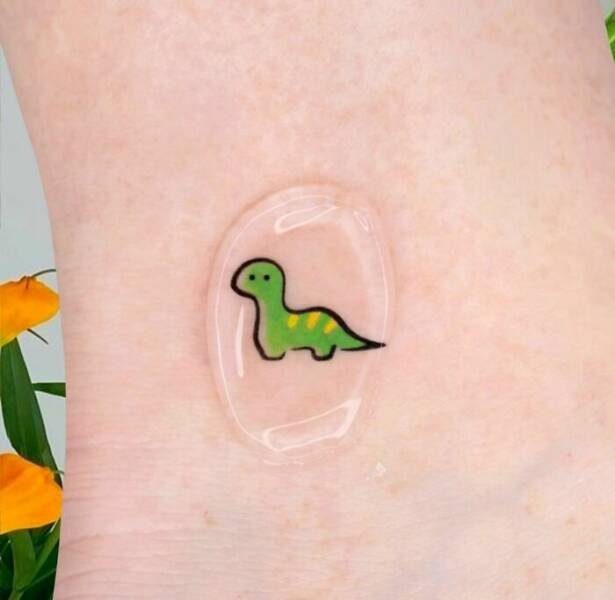Cool Tattoos For Dinosaur Lovers (23 pics)