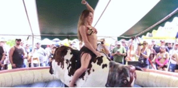 Girl Bounces Into A Wardrobe Malfunction While Riding Bull