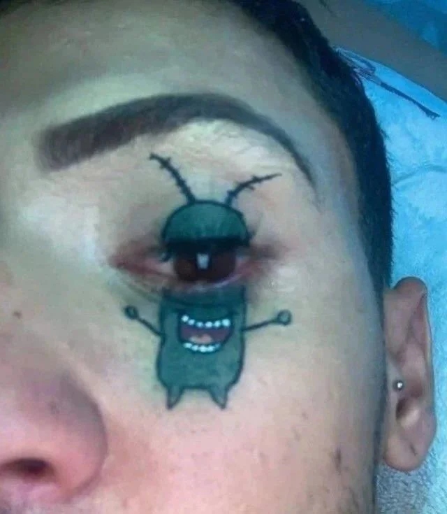 Awful Tattoos (14 pics) Awful Tattoos (14 pics)