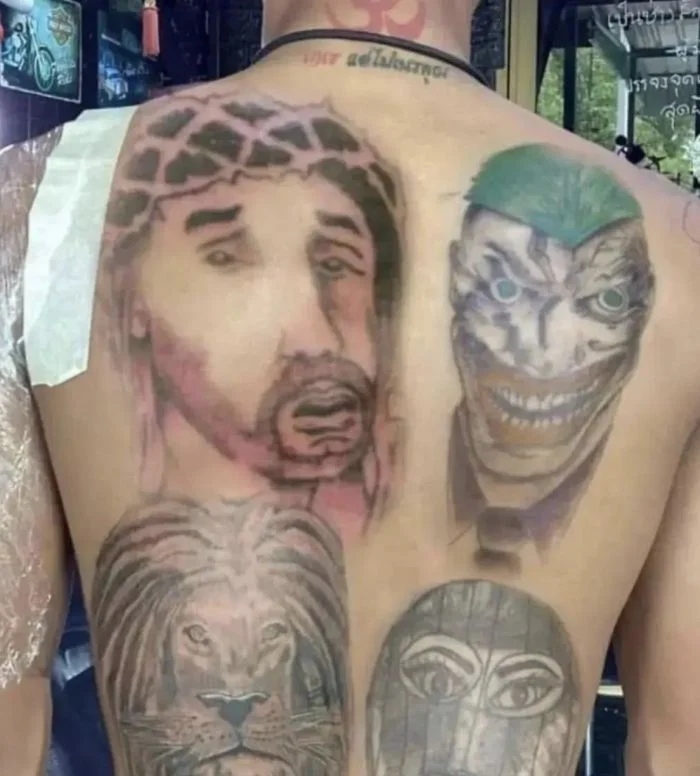 Awful Tattoos (14 pics) Awful Tattoos (14 pics)