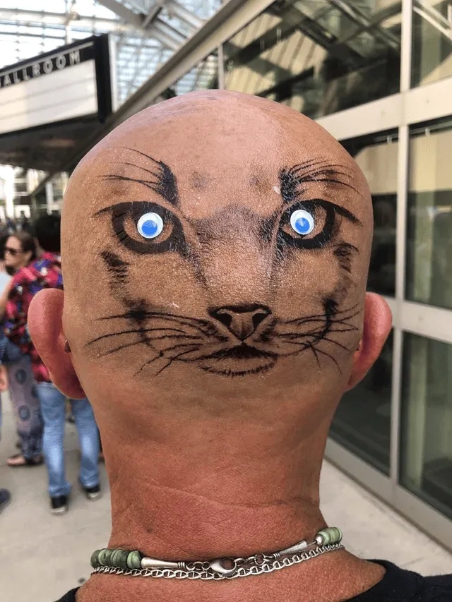 Strange Tattoos (18 pics) Strange Tattoos (18 pics)