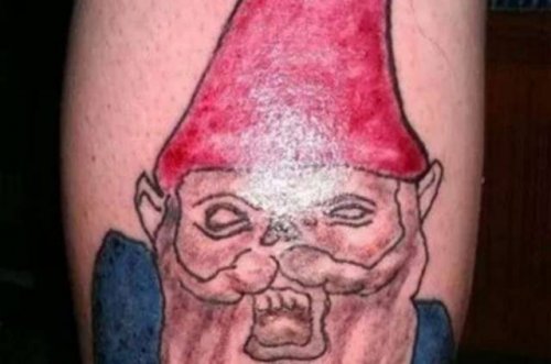 Awful Tattoos (23 pics) Awful Tattoos (23 pics)