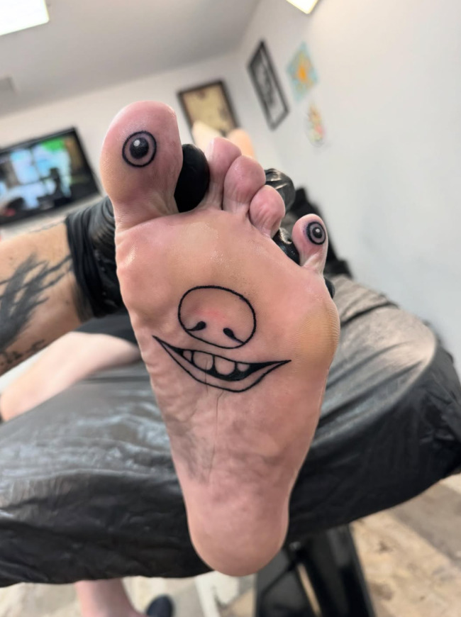 Weird Tattoos (25 pics) Weird Tattoos (25 pics)